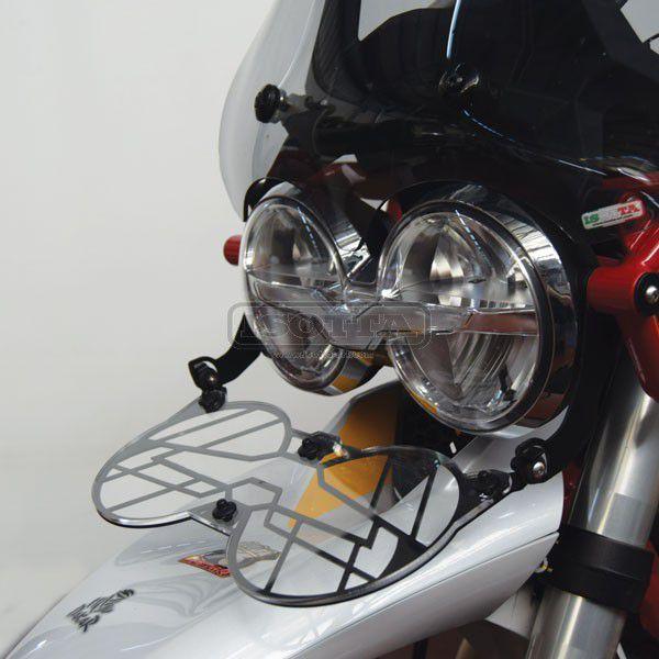 Folding headlight protection grill suitable for Moto Guzzi V85 TT - folded down
